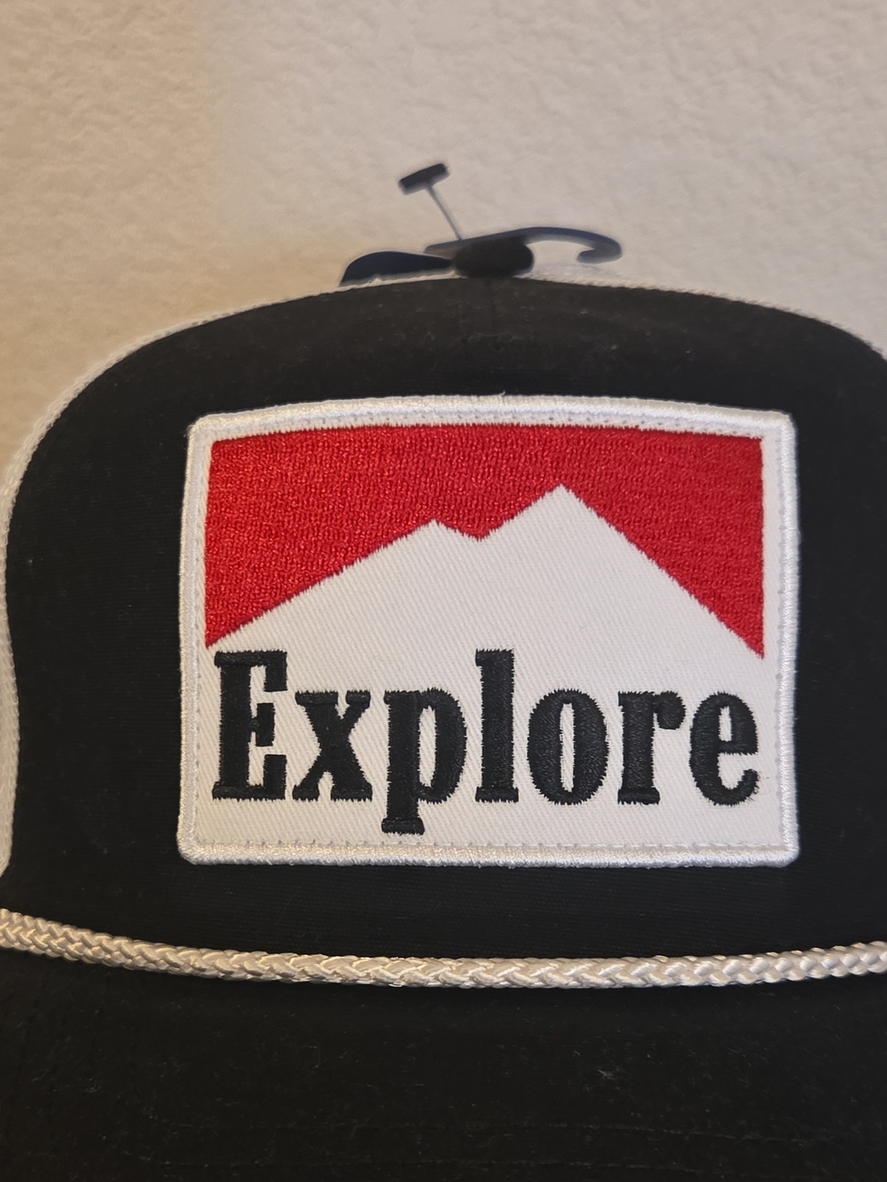 George Black Trucker Hat with Red and White Explore Patch